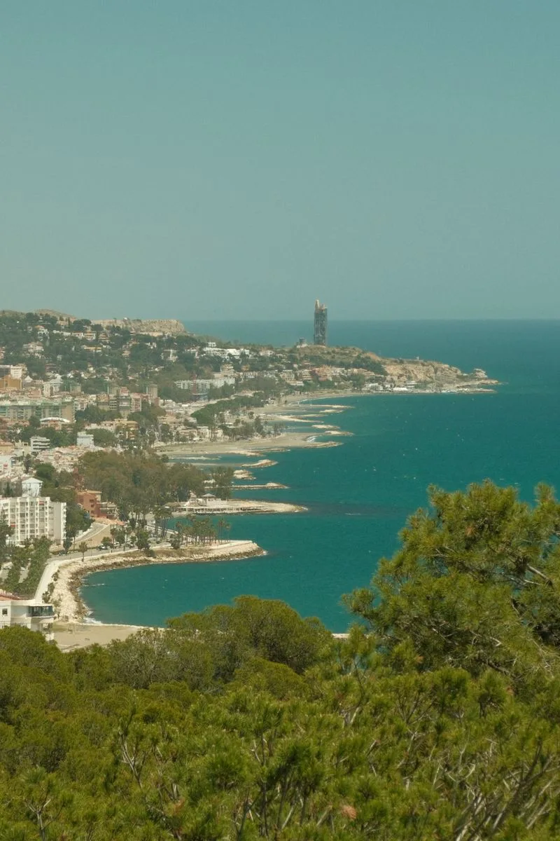 Stunning aerial view of the Mediterranean coast in Spain showcasing beaches and urban landscape.